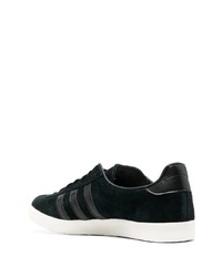 Baskets basses en cuir noires adidas