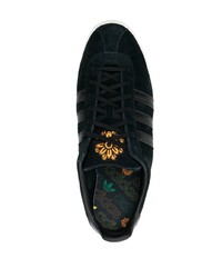 Baskets basses en cuir noires adidas