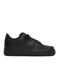 Baskets basses en cuir noires Nike