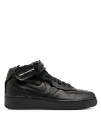 Baskets basses en cuir noires Nike