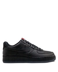 Baskets basses en cuir noires Nike