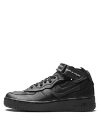 Baskets basses en cuir noires Nike