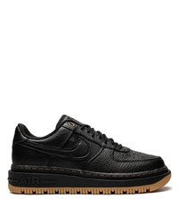 Baskets basses en cuir noires Nike