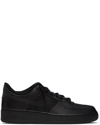 Baskets basses en cuir noires Nike