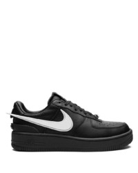 Baskets basses en cuir noires Nike