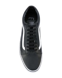 Baskets basses en cuir noires Vans