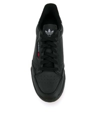 Baskets basses en cuir noires adidas