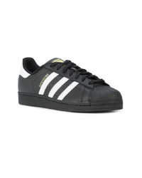 Baskets basses en cuir noires adidas