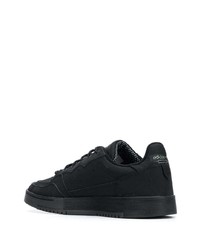 Baskets basses en cuir noires adidas