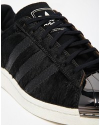 Baskets basses en cuir noires adidas