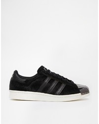 Baskets basses en cuir noires adidas