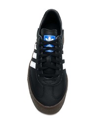 Baskets basses en cuir noires adidas