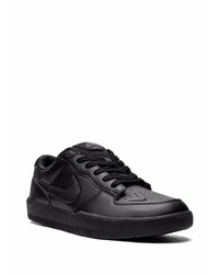 Baskets basses en cuir noires Nike