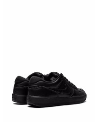 Baskets basses en cuir noires Nike