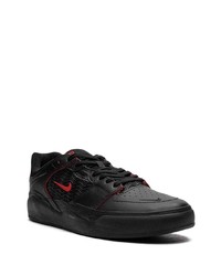 Baskets basses en cuir noires Nike