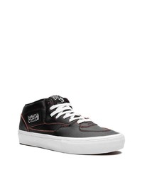 Baskets basses en cuir noires Vans