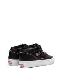 Baskets basses en cuir noires Vans