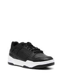 Baskets basses en cuir noires Puma