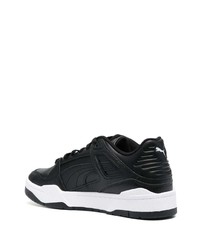 Baskets basses en cuir noires Puma