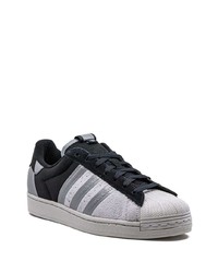 Baskets basses en cuir noires adidas