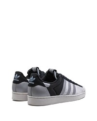 Baskets basses en cuir noires adidas