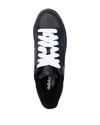 Baskets basses en cuir noires adidas