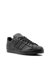 Baskets basses en cuir noires adidas