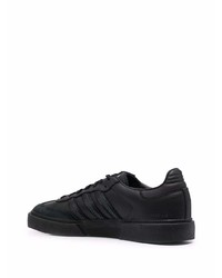 Baskets basses en cuir noires adidas