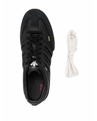 Baskets basses en cuir noires adidas