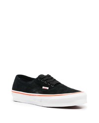 Baskets basses en cuir noires Vans