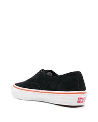 Baskets basses en cuir noires Vans