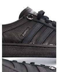 Baskets basses en cuir noires adidas