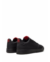 Baskets basses en cuir noires adidas