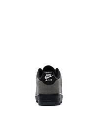 Baskets basses en cuir noires Nike