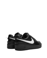 Baskets basses en cuir noires Nike