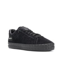 Baskets basses en cuir noires Puma