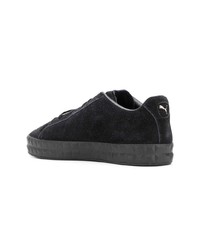 Baskets basses en cuir noires Puma