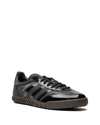 Baskets basses en cuir noires adidas