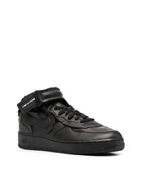 Baskets basses en cuir noires Nike