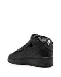 Baskets basses en cuir noires Nike