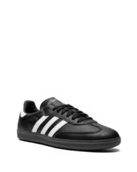 Baskets basses en cuir noires adidas