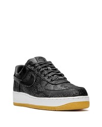 Baskets basses en cuir noires Nike