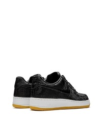 Baskets basses en cuir noires Nike