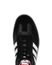 Baskets basses en cuir noires adidas