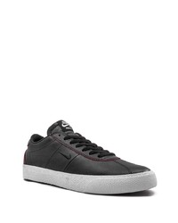 Baskets basses en cuir noires Nike