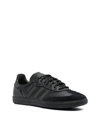 Baskets basses en cuir noires adidas