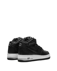 Baskets basses en cuir noires Nike