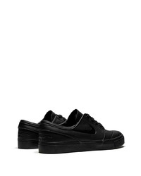 Baskets basses en cuir noires Nike