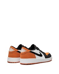 Baskets basses en cuir orange Jordan