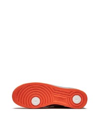 Baskets basses en cuir orange Nike